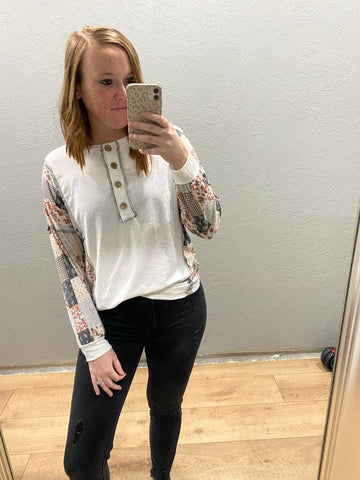 White Top with Floral Detail